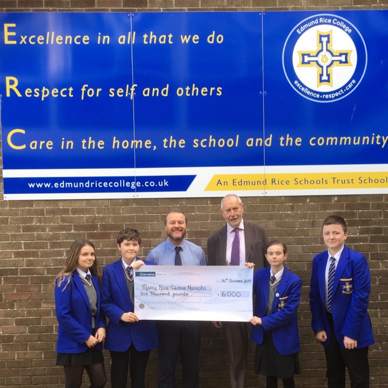 Edmund Rice College presenting cheque to Edmund Rice Development